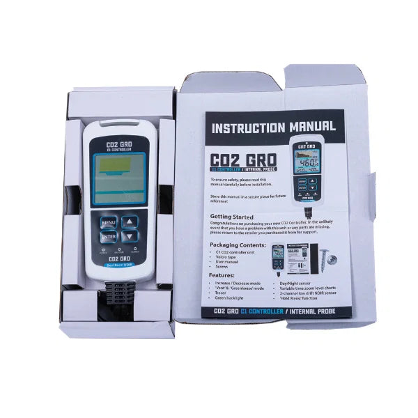 CO2 monitor with packaging and instruction manual on a white background