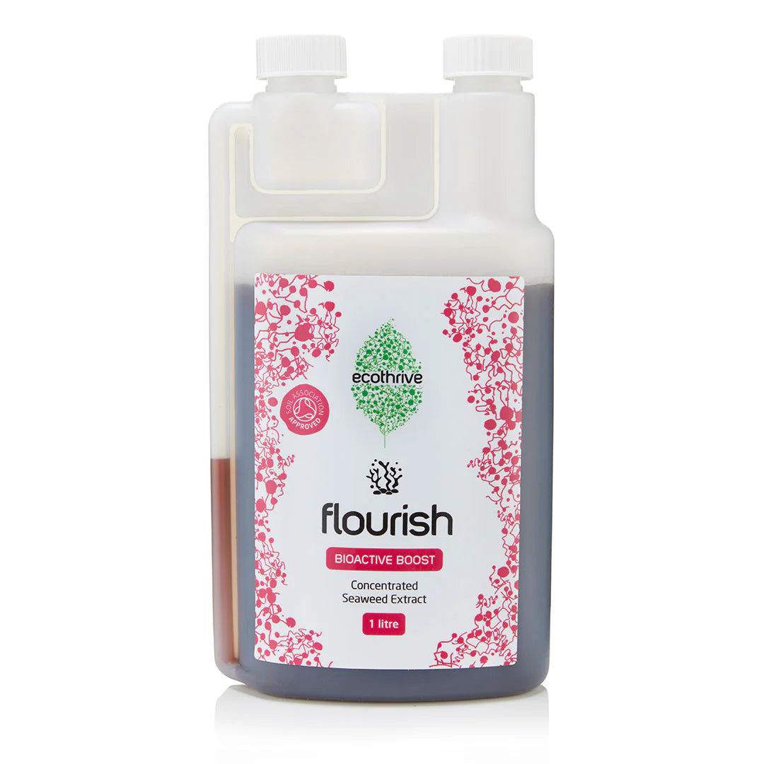 1L Bottle of Ecothrive 'flourish' bioactive boost with floral design on a white background