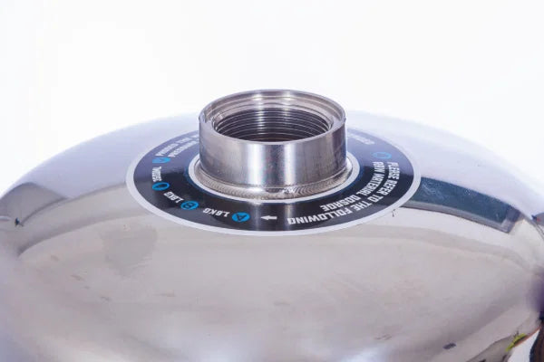 Close-up of a metallic component with branding on a white background