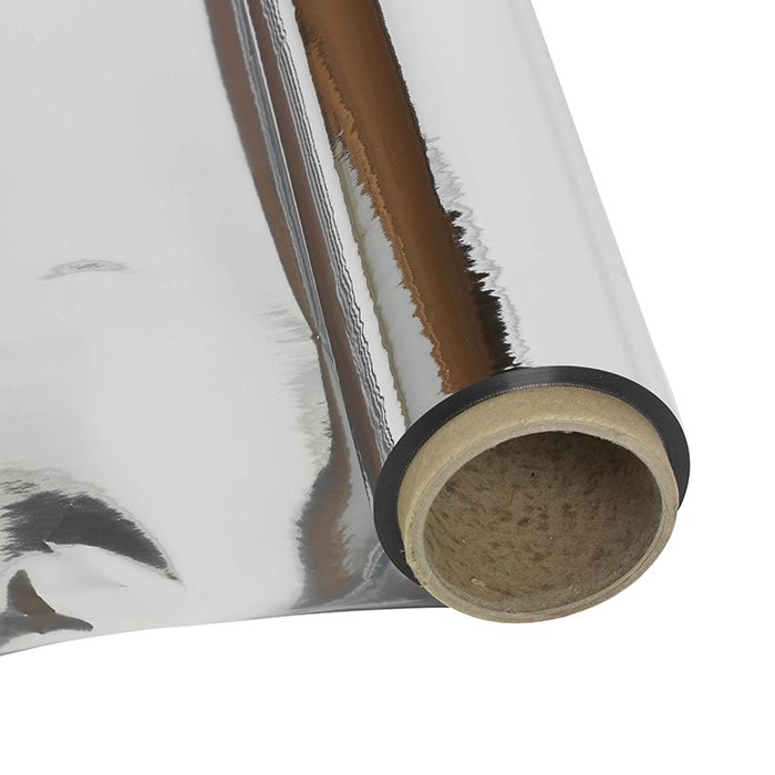 A roll of silver Mylar sheeting, used for reflective lighting in grow rooms.